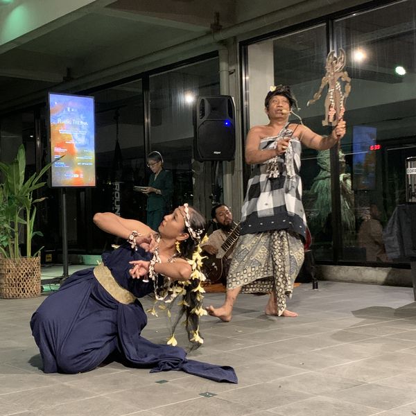 Dancers performing with a wayang puppet on opening night
